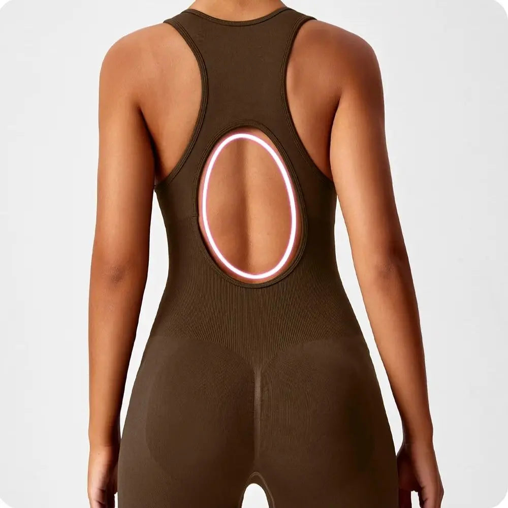 One-piece peach-colored yoga bodysuit with matching boot from Corporación Turística, shown on a neutral background.