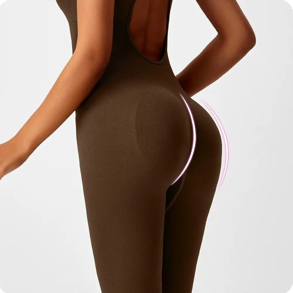 One-piece peach-colored yoga bodysuit with matching boot, designed for comfort and flexibility, by Corporación Turística.