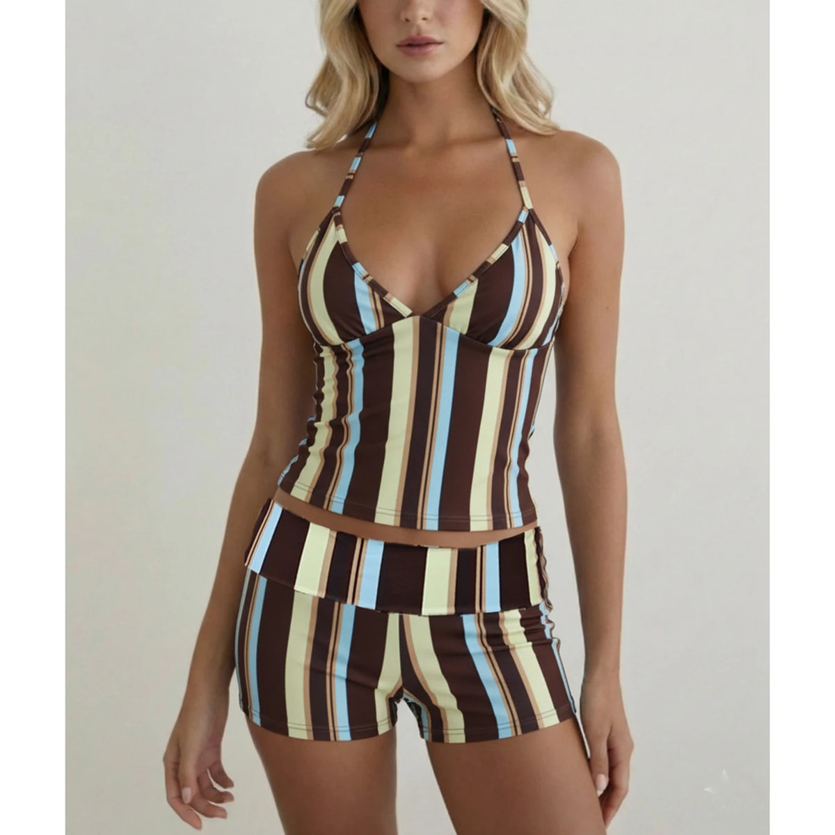 Summer women's 2-piece clothing set by Corporación Turística, featuring a fitted top and matching shorts in brown.