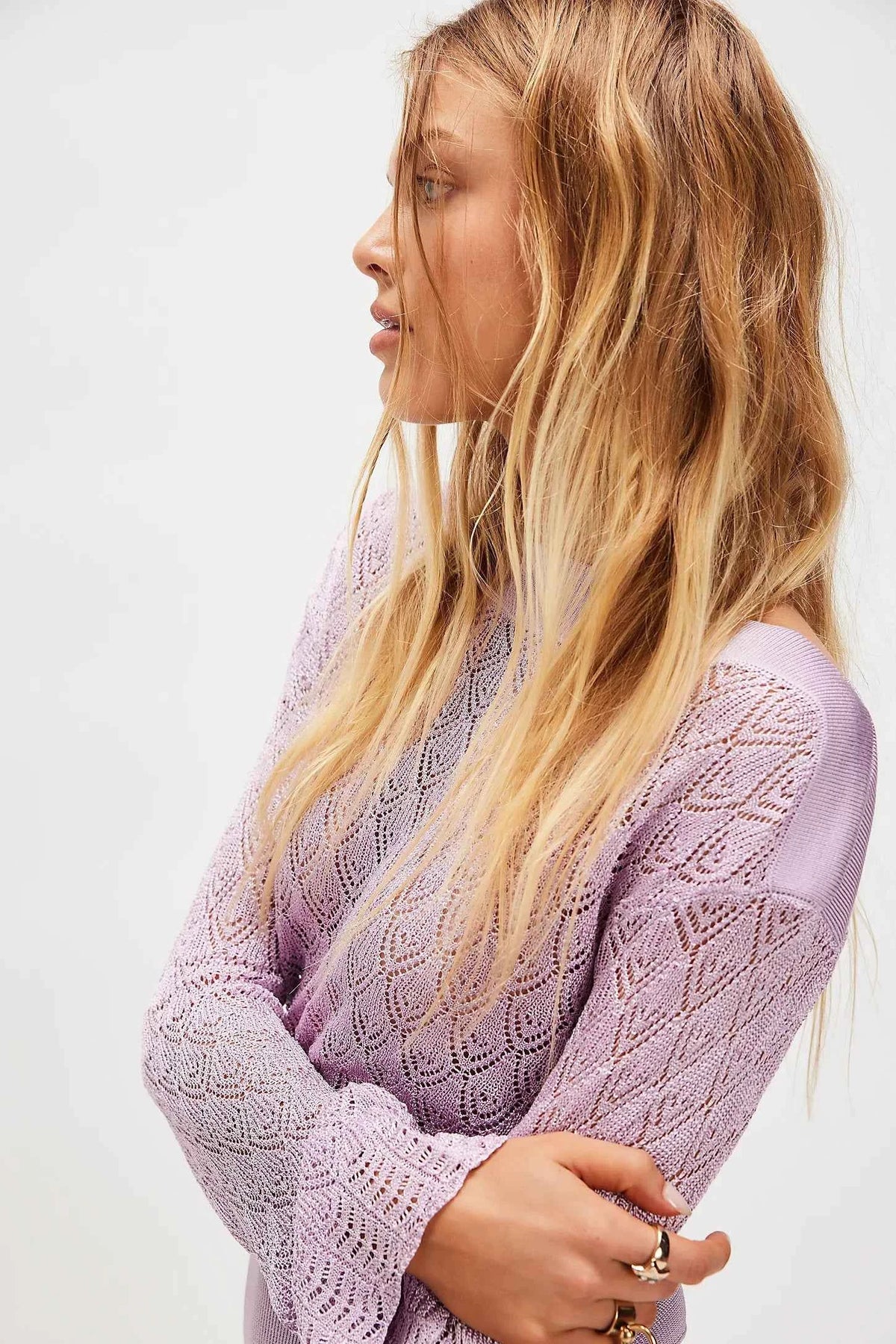 Maroon long-sleeve knit top for women by Corporación Turística, short style with fitted design, shown on a model.