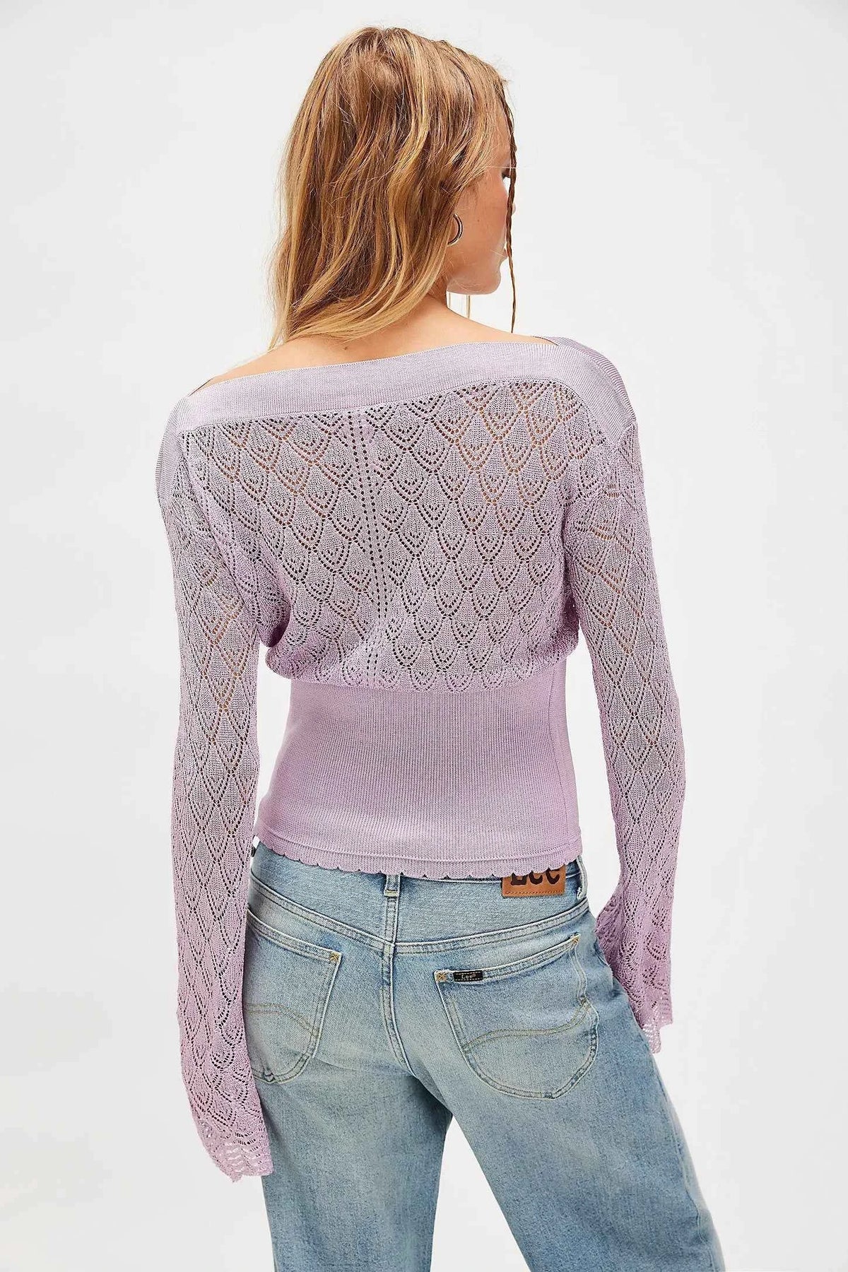 Long-sleeve women's knit top by Corporación Turística in brown, featuring a short, fitted design and soft, cozy fabric.