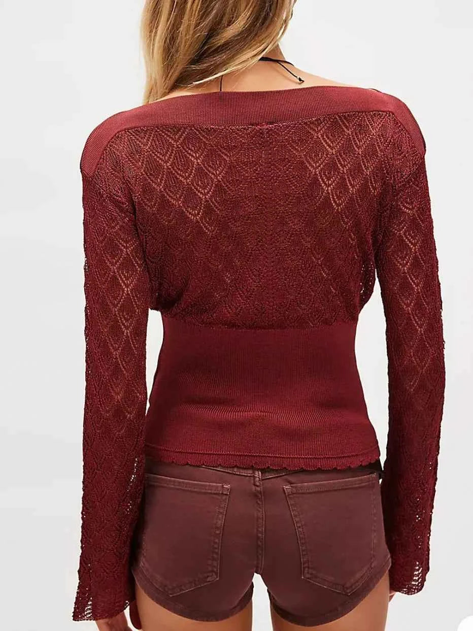 Long-sleeve women's knit top by Corporación Turística in brown, featuring a cropped design and casual style.