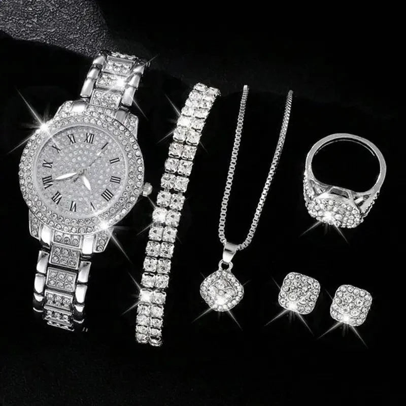 Stainless steel Roman numeral wristwatch with diamond accents from Corporación Turística, featuring a sleek strap and elegant design.