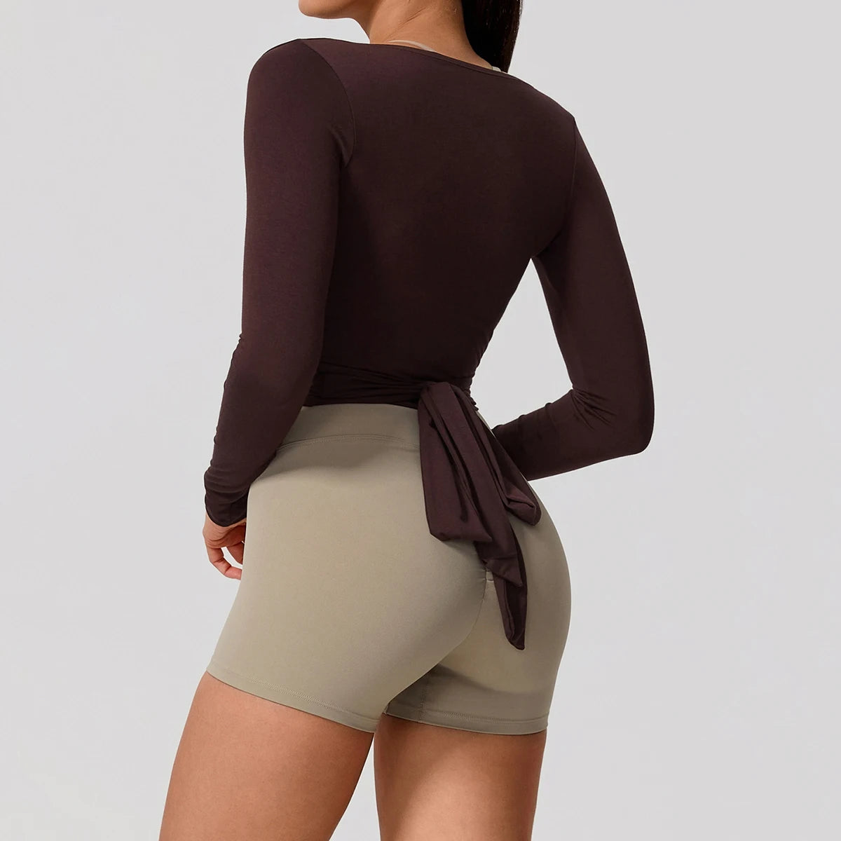 Long-sleeve yoga t-shirt for women by Hearuisavy, made of comfortable fabric, featuring a stylish design, perfect for active wear.
