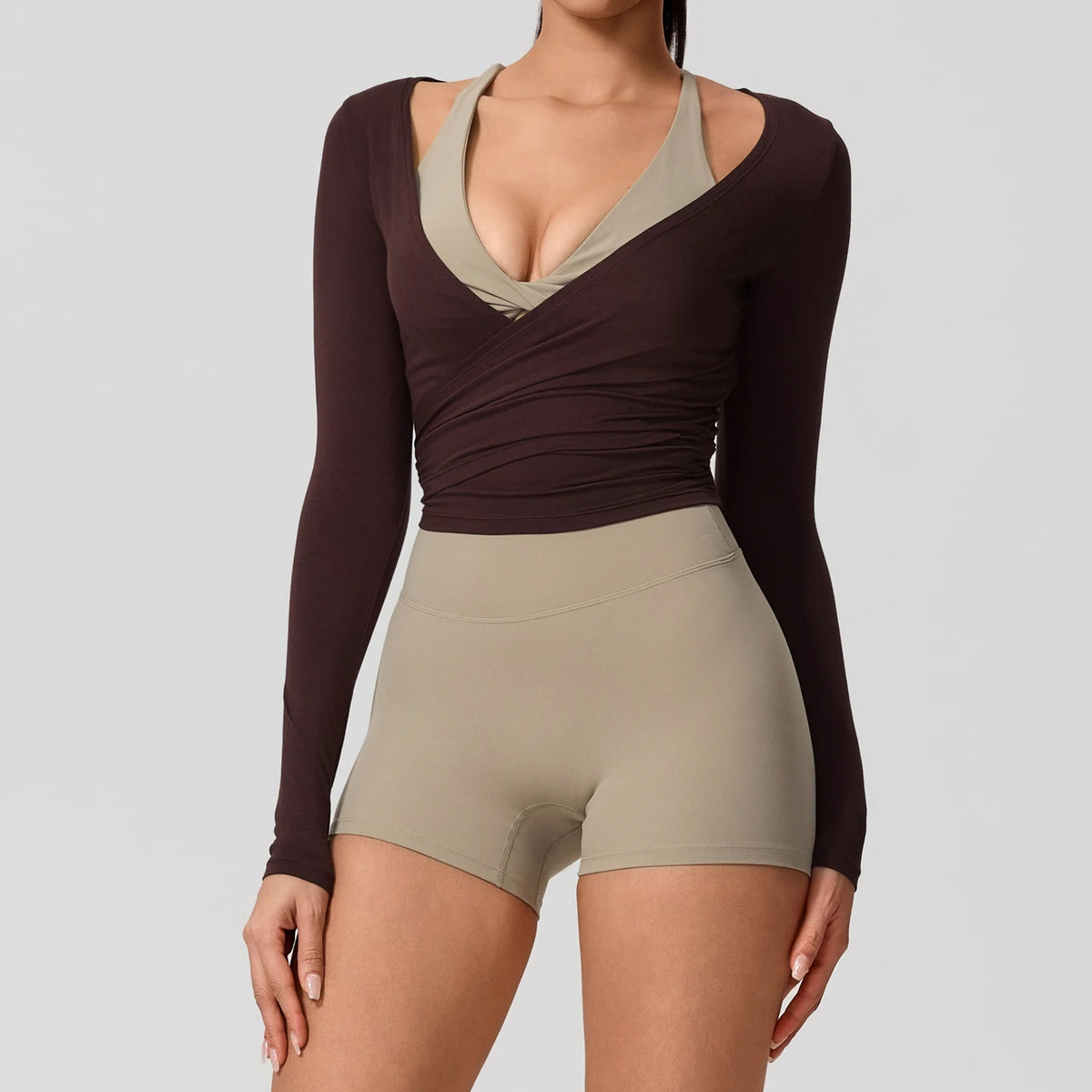 Long-sleeve yoga T-shirt for women by Hearuisavy, made of comfortable fabric, in a casual style suitable for activewear.