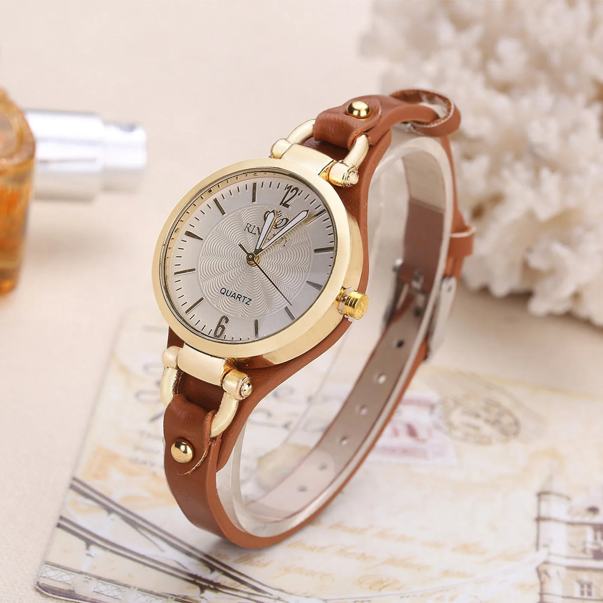 Mint green fashion women's quartz watch by Corporación Turística, close-up of the sleek watch face and strap.