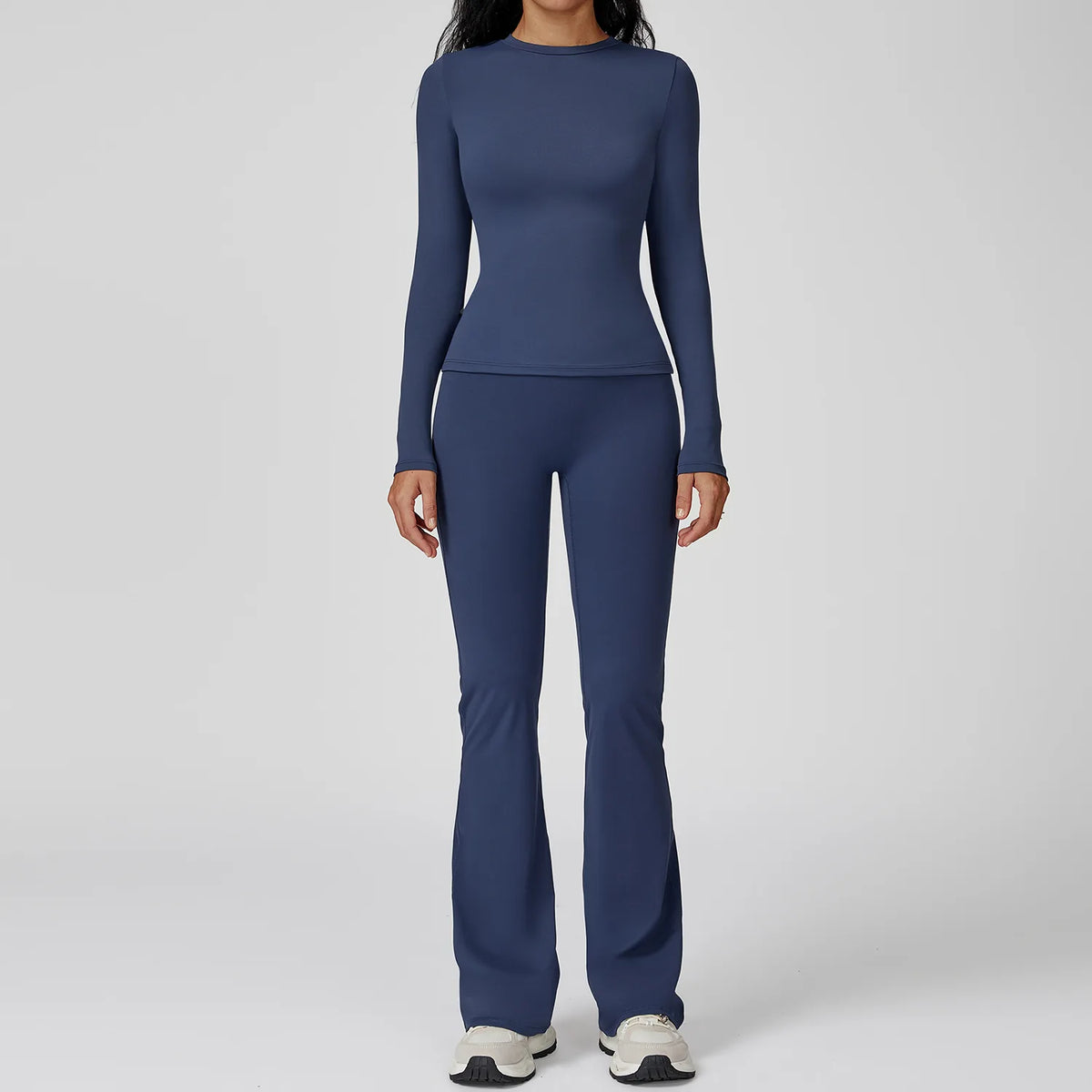 Mocha brown yoga workout set with two pieces, sportswear by Corporación Turística, featuring comfortable stretchy fabric.