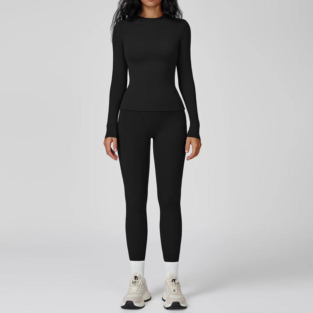 Mocha brown yoga set with two pieces from Corporación Turística, featuring comfortable athletic clothing for exercise and relaxation.