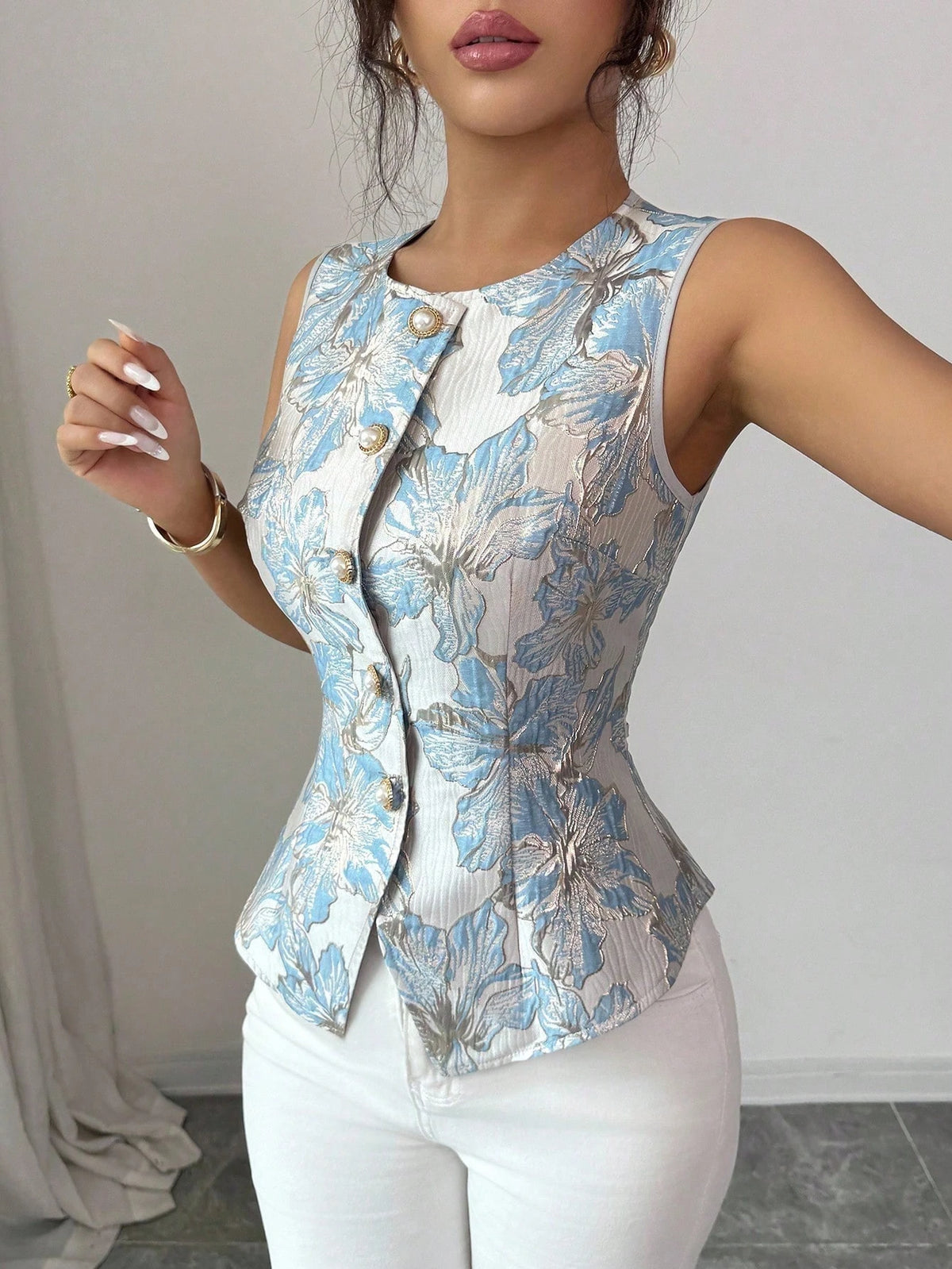 Elegant blue women's blouse from Corporación Turística's 2026 collection, shown in a stylish, well-fitted design.