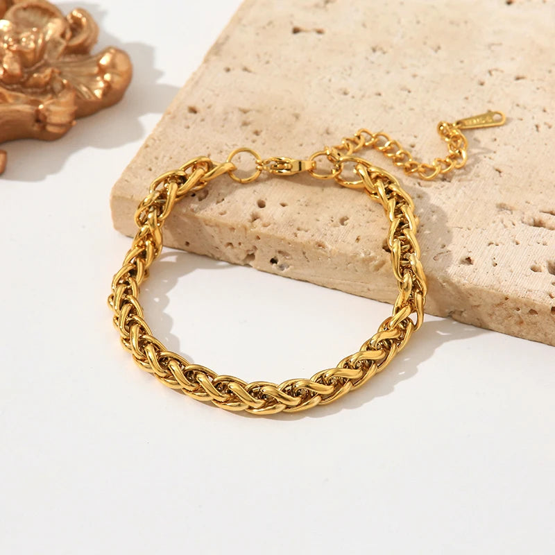 EILIECK stainless steel chain necklace and bracelet set displayed with shiny silver links on a white background.