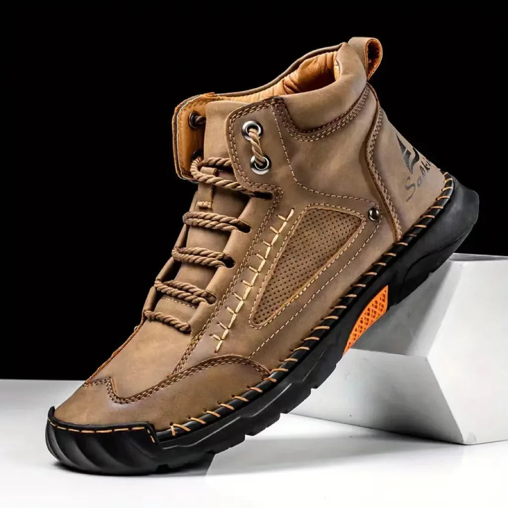 Navy blue men's leather casual boots by Corporación Turística, suitable for outdoor wear, showing laced design and sturdy sole.