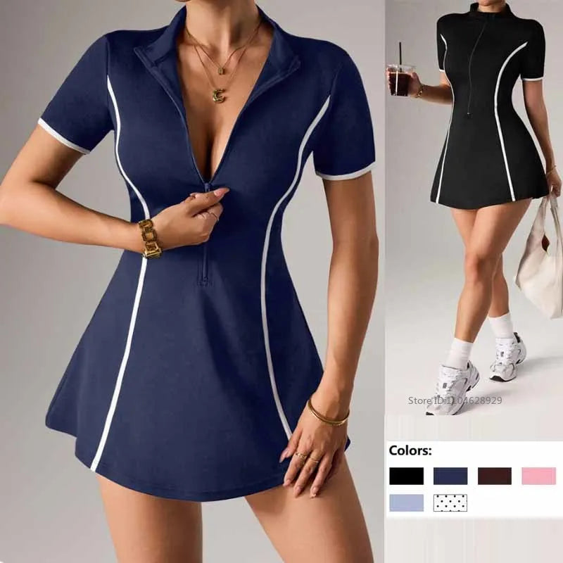 Navy blue women's tennis dress with short sleeves and polo collar, by Corporación Turística, shown on a model.