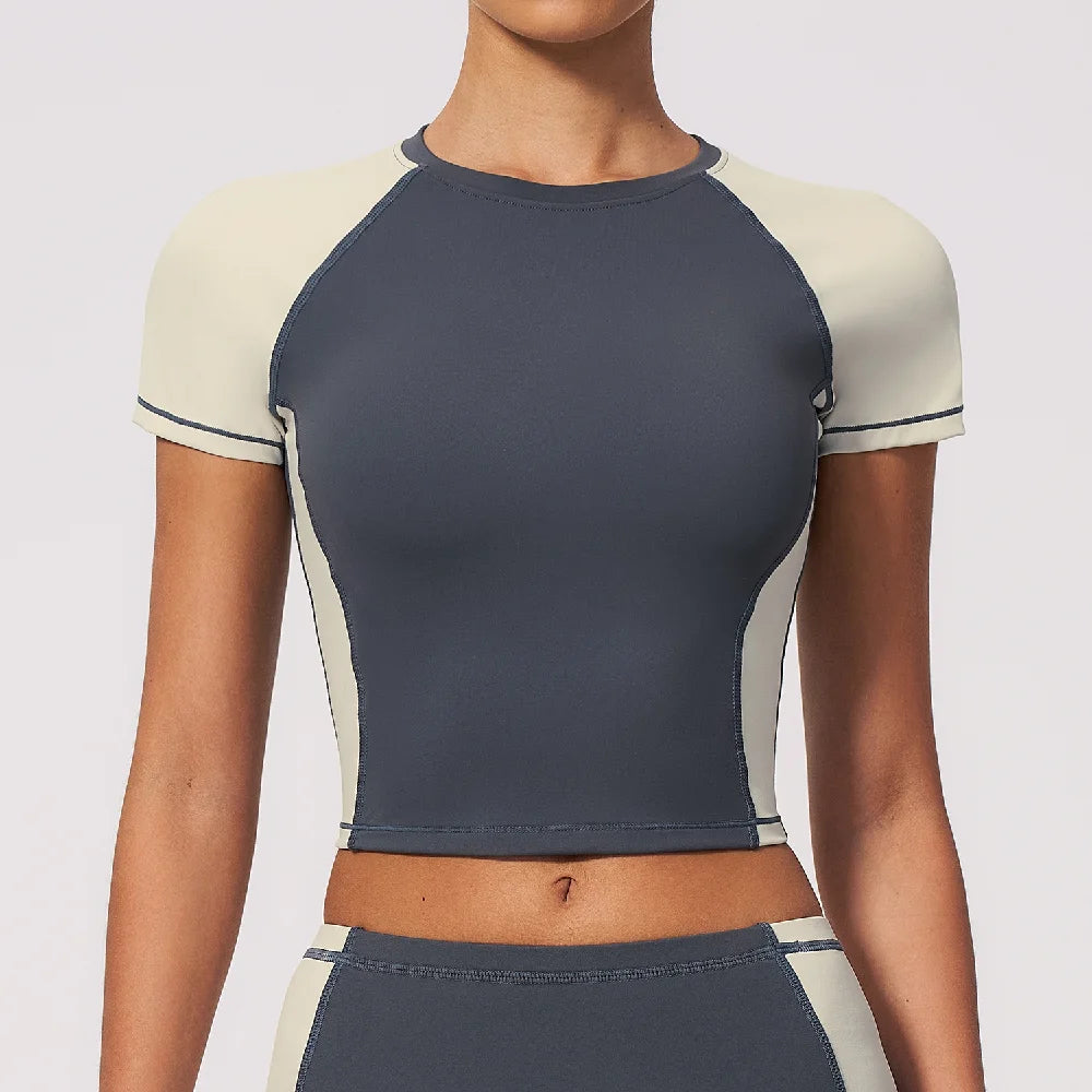 Navy blue breathable yoga t-shirt for women by Corporación Turística, lightweight and comfortable for exercise or casual wear.