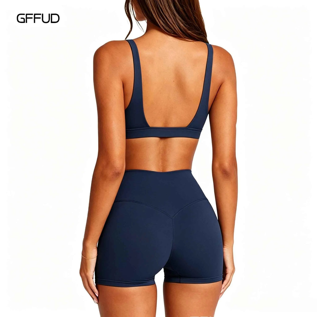 Navy women's yoga set with sports bra and matching leggings from Corporación Turística, designed for comfort and flexibility.