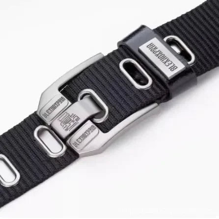 Black men's canvas belt with metal buckle, 120cm length, from Corporación Turística, casual and durable accessory.