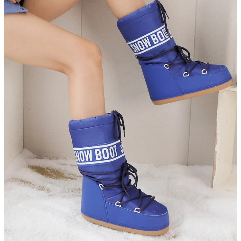 Winter women's snow boots by Corporación Turística in black, mid-calf length, with waterproof design and cozy lining.
