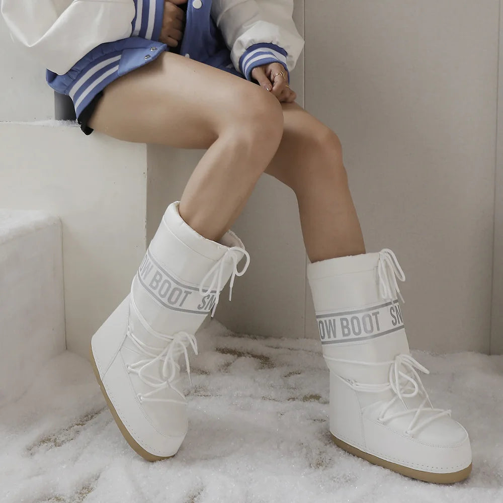 Black women's winter snow boots by Corporación Turística, knee-high winter boots with insulated lining and rugged sole.
