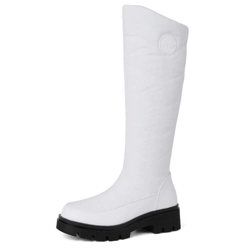White warm leather snow boots for women by Corporación Turística, featuring a cozy design and durable winter footwear.