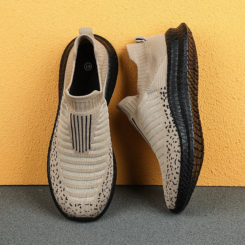 Black men's breathable sneakers from Corporación Turística, lightweight athletic shoes with comfortable design for everyday wear.