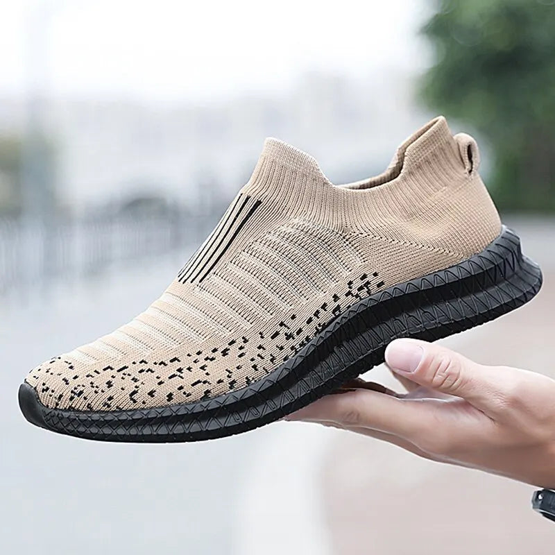 Black men's breathable sneakers from Corporación Turística, featuring lightweight and comfortable design for everyday wear.