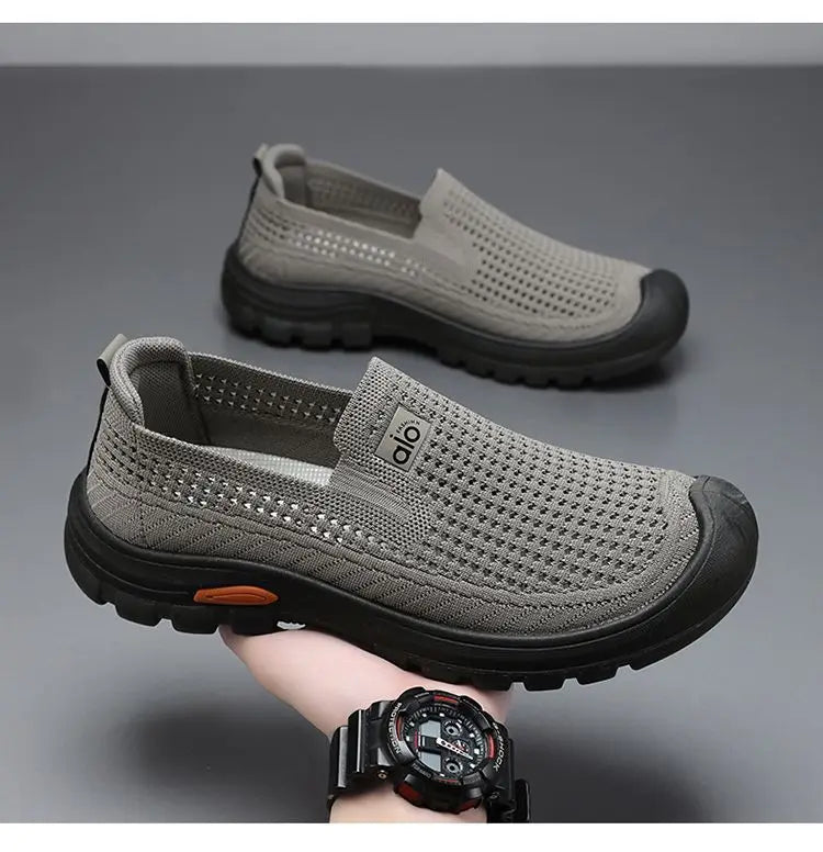 Men's summer breathable mesh shoes by Corporación Turística, black, lightweight and comfortable for warm weather.