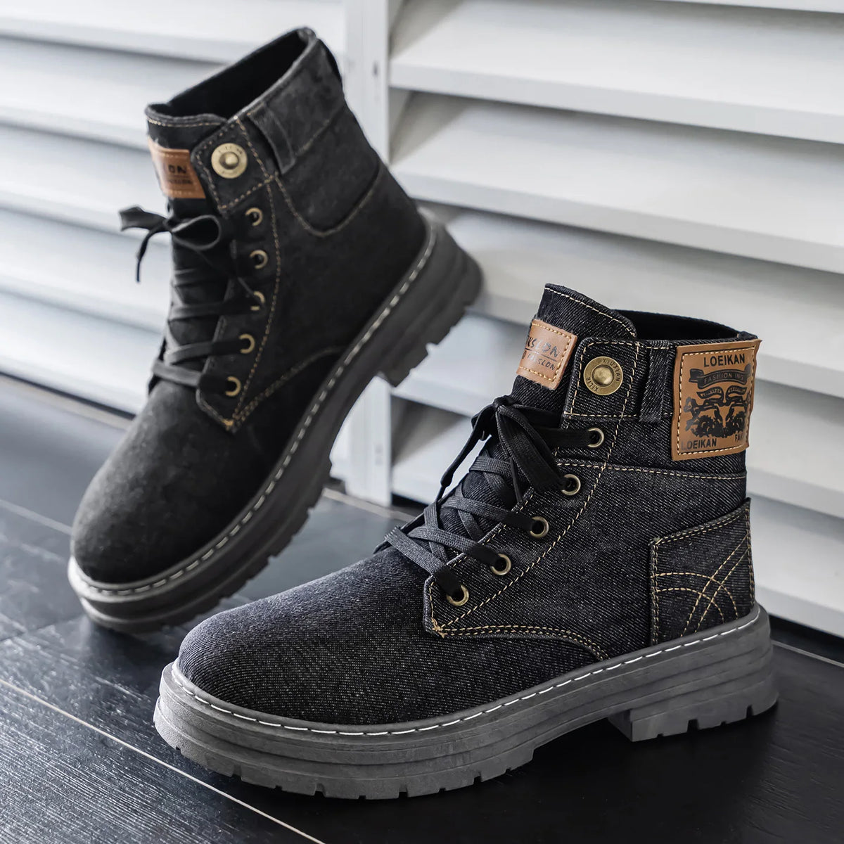 Black men's hiking boots by Corporación Turística, versatile and comfortable outdoor footwear with sturdy design and secure laces.