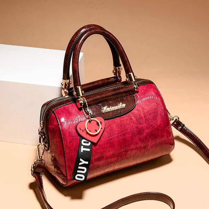 Luxury designer black shoulder bag for women, stylish and elegant with sleek craftsmanship from Corporación Turística.
