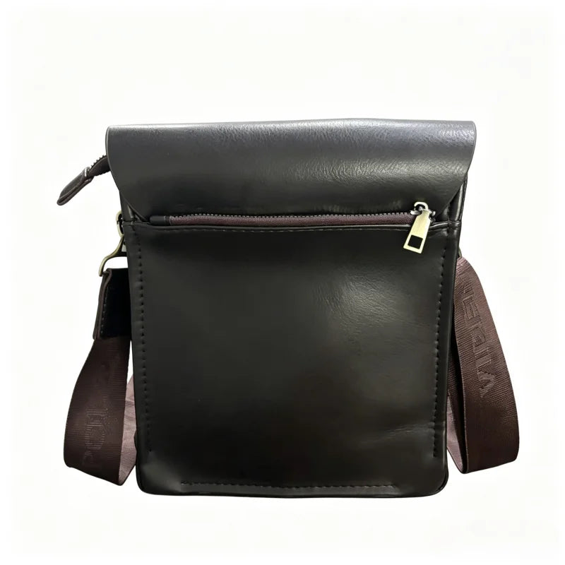 Black men's vertical Polo shoulder bag by Corporación Turística, casual style with adjustable strap and multiple compartments.
