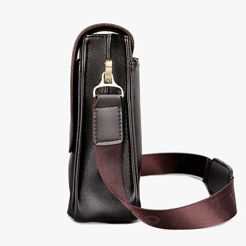 Black Polo men's vertical shoulder bag from Corporación Turística, casual style with adjustable strap and multiple compartments.