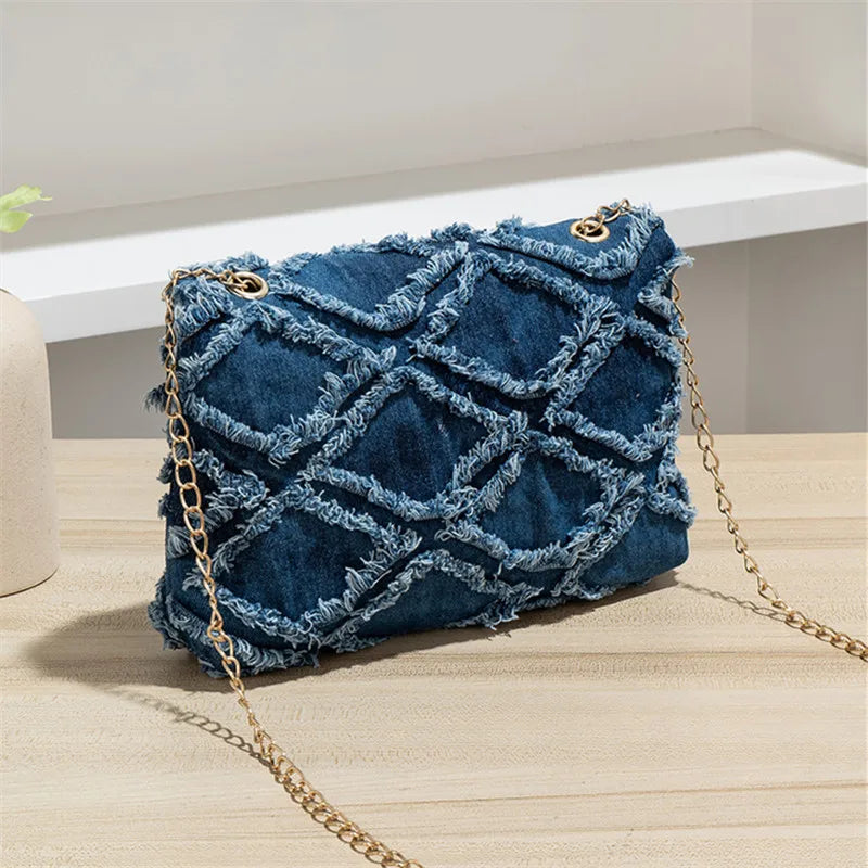 Black crossbody handbag for jeans, stylish hand purse from Corporación Turística with a sleek design and functional size.