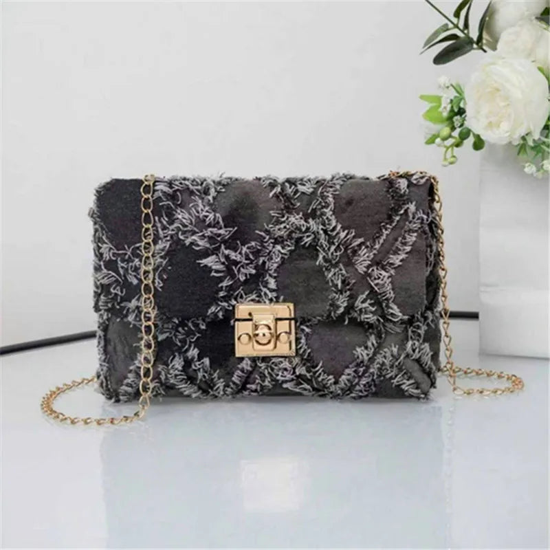 Black crossbody handbag by Corporación Turística featuring a stylish design, perfect for casual wear and versatile outfit pairing.