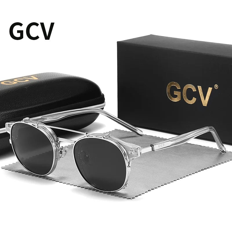 Black and gold GCV sunglasses with dual-layer removable lenses, stylish frame from Corporación Turística, shown with lenses removed.