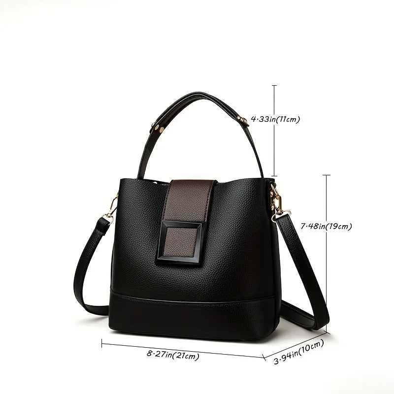 Elegant black solid color bucket bag with adjustable shoulder strap, stylish and versatile for everyday use, by Corporación Turística.