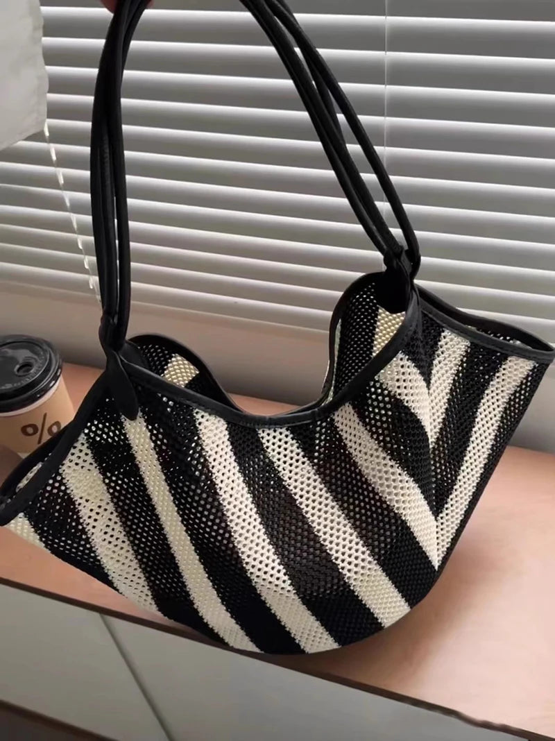 Black HIGHREAL Forest crossbody bag with a lazy style design, featuring a sleek look perfect for casual wear.