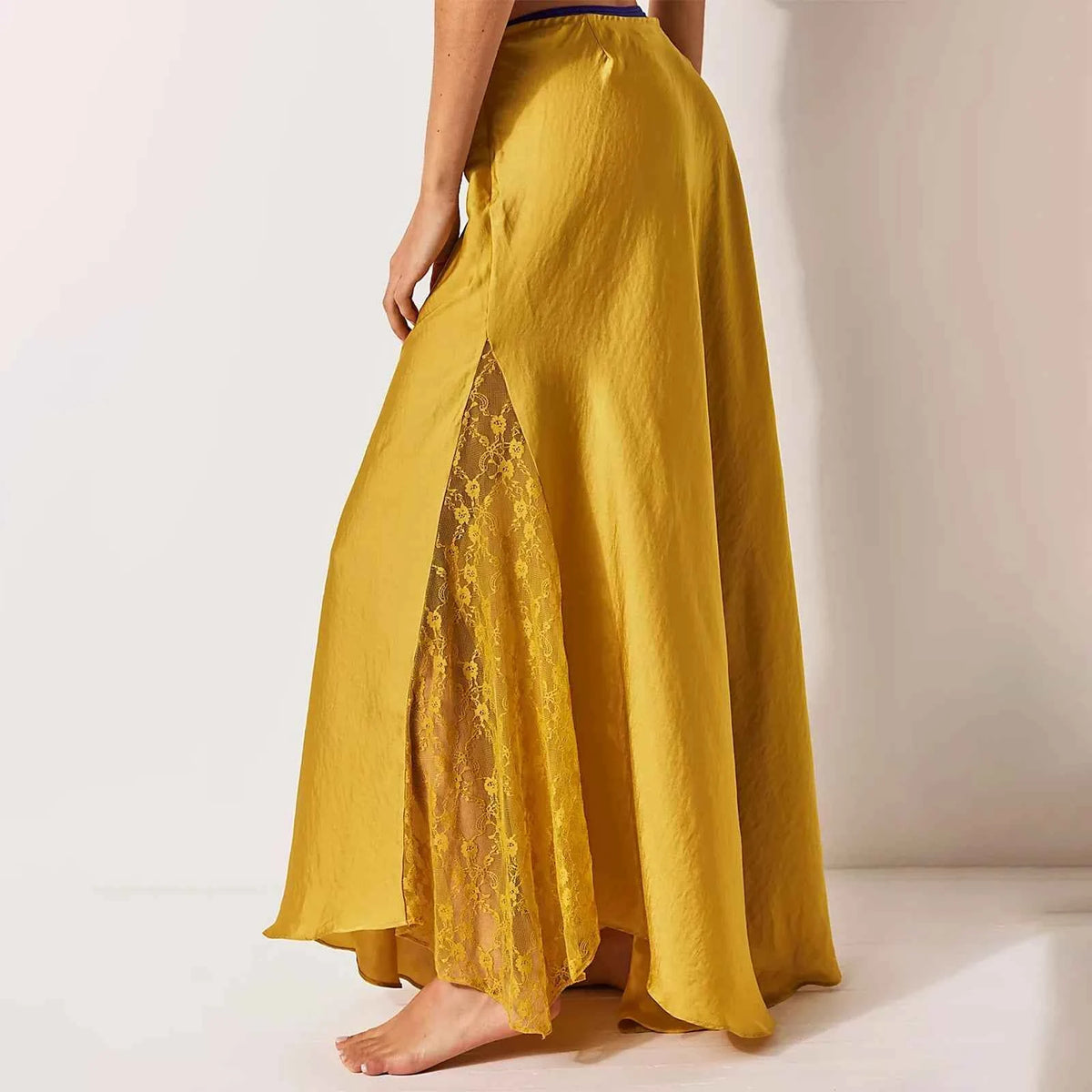 Elegant black long skirt for women, smooth and flowy, from Corporación Turística, perfect for stylish and sophisticated outfits.