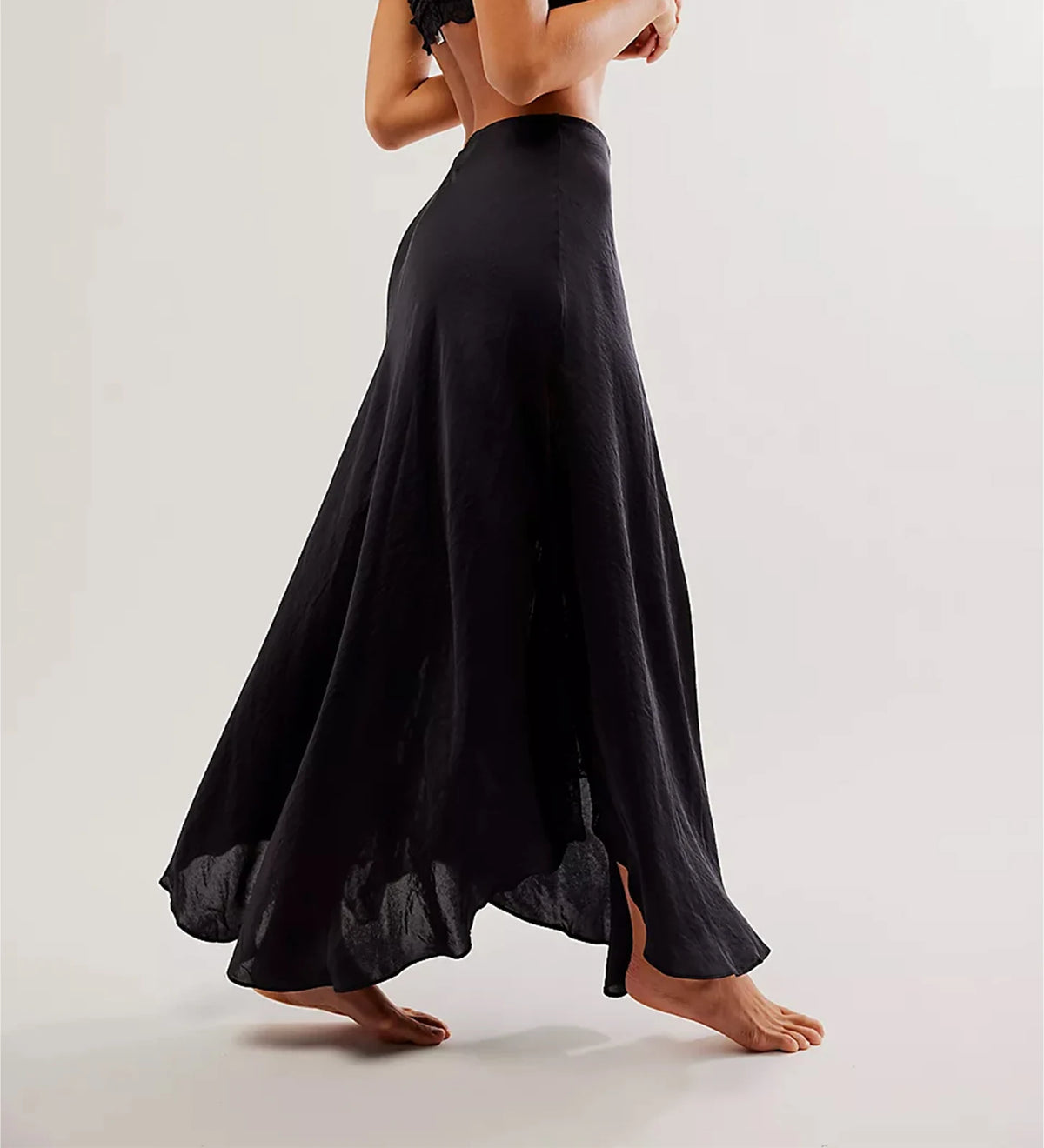 Elegant black long skirt for women by Corporación Turística, featuring a sleek, simple design and comfortable fit.