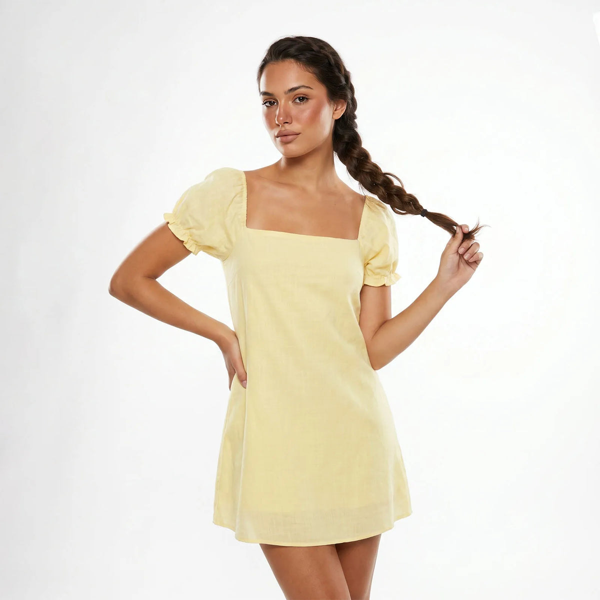 Black short spring and summer dress for women by Corporación Turística, featuring lightweight fabric and a stylish, casual design.