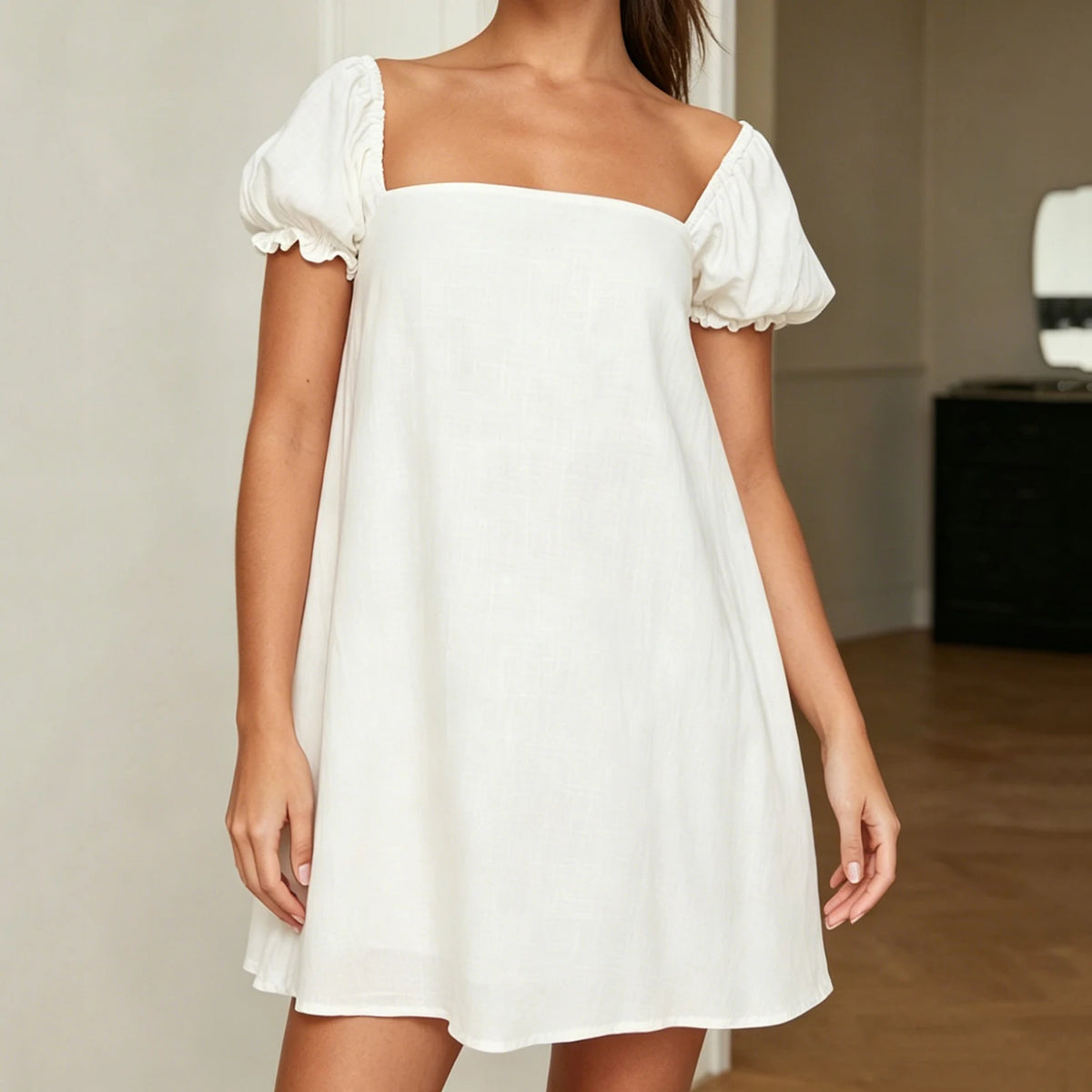 Black short spring and summer women's dress by Corporación Turística, lightweight and stylish for warm weather.