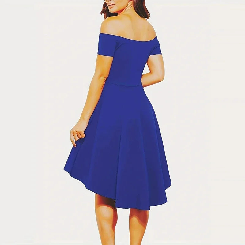 Elegant black midi asymmetric dress with off-shoulder design by Corporación Turística, shown on a model.