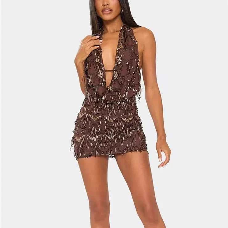 Black mini halter dress with sequins for women, featuring a high neckline and stylish fit, by Corporación Turística.
