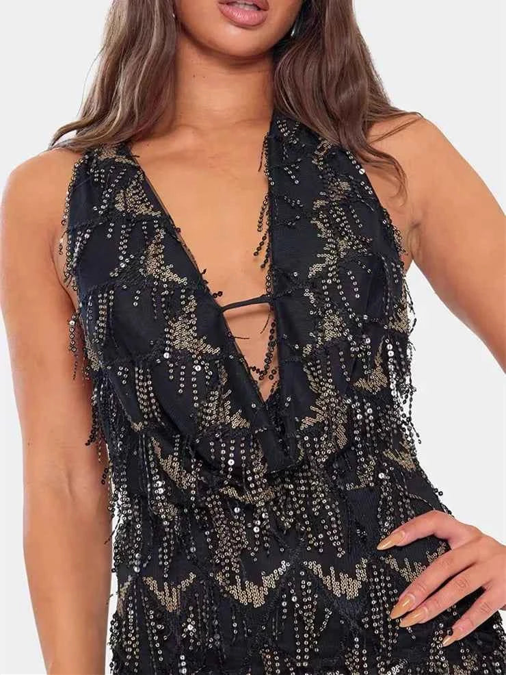 Black mini halter dress with sequins for women, featuring a halter neckline and fitted silhouette, designed by Corporación Turística.