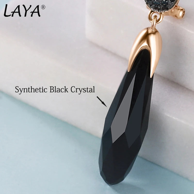 Long retro silver earrings with intricate design, made from 925 sterling silver, featuring black accents and elegant craftsmanship.