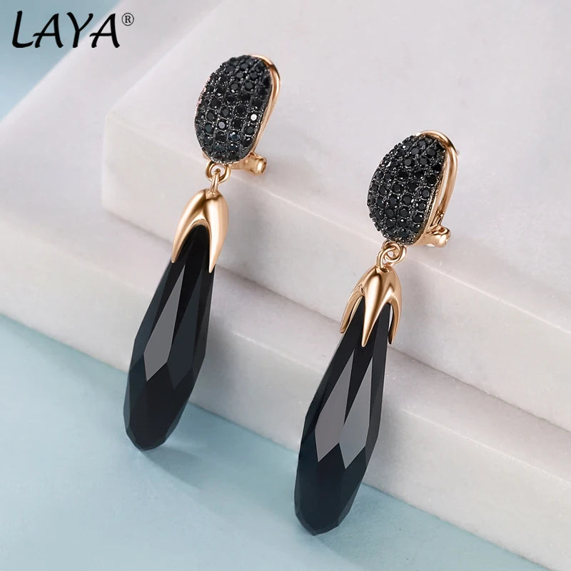 Long retro silver earrings by Corporación Turística, 925 sterling silver with intricate decorative details.
