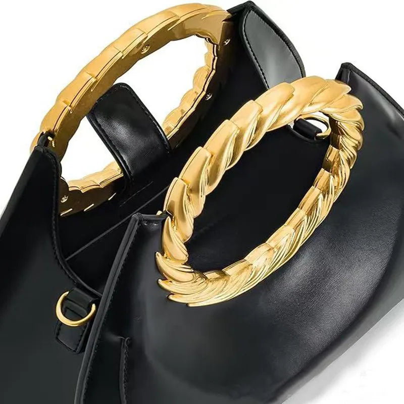 Luxury women's black handbag from Nuevo Diseño 2026 collection by Corporación Turística, featuring elegant design and high-quality materials.