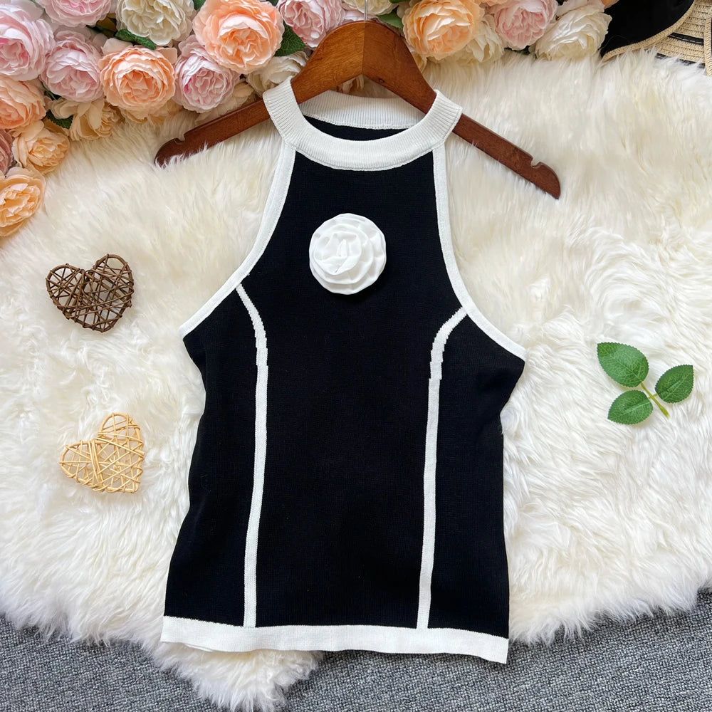 Black YuooMuoo women's Y2K fashion knit top, elegant and trendy, shown on a model with stylish details and a fitted silhouette.