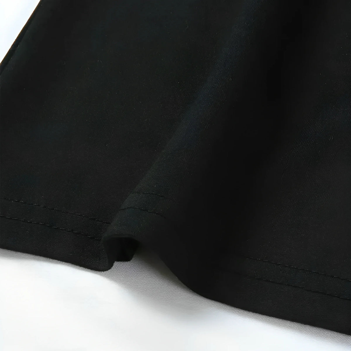 Black sleeveless women's camisón with V-neck, size XL, from Corporación Turística, shown laid flat on a white background.