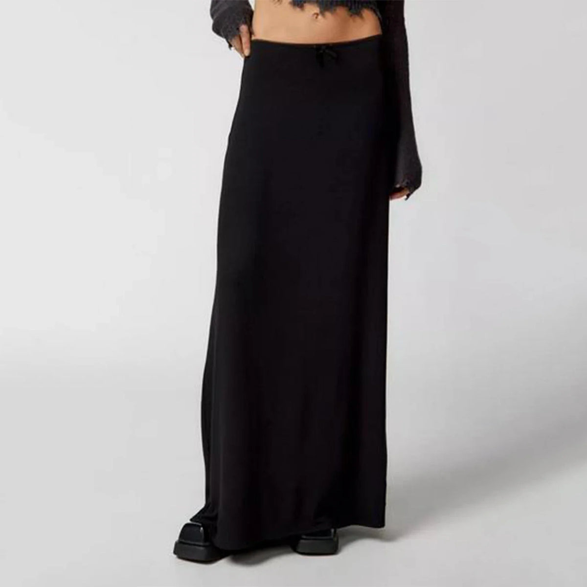 Long informal black women's skirts, straight style, from Corporación Turística, shown on a model against a plain background.