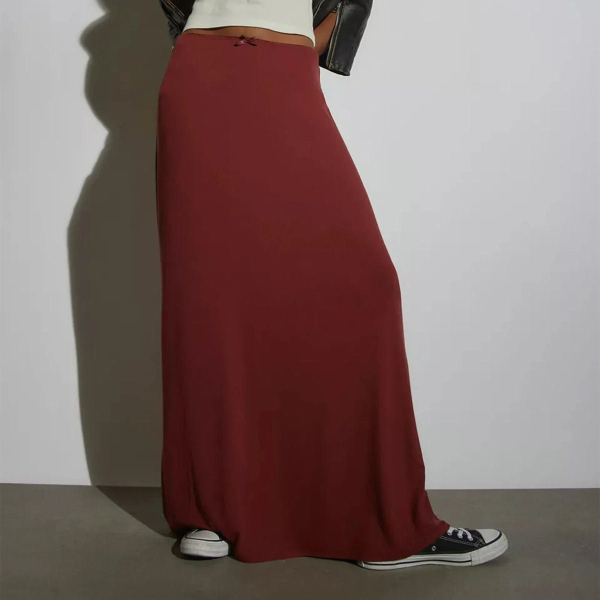 Long casual black women's skirt with a straight fit from Corporación Turística, shown on a model.