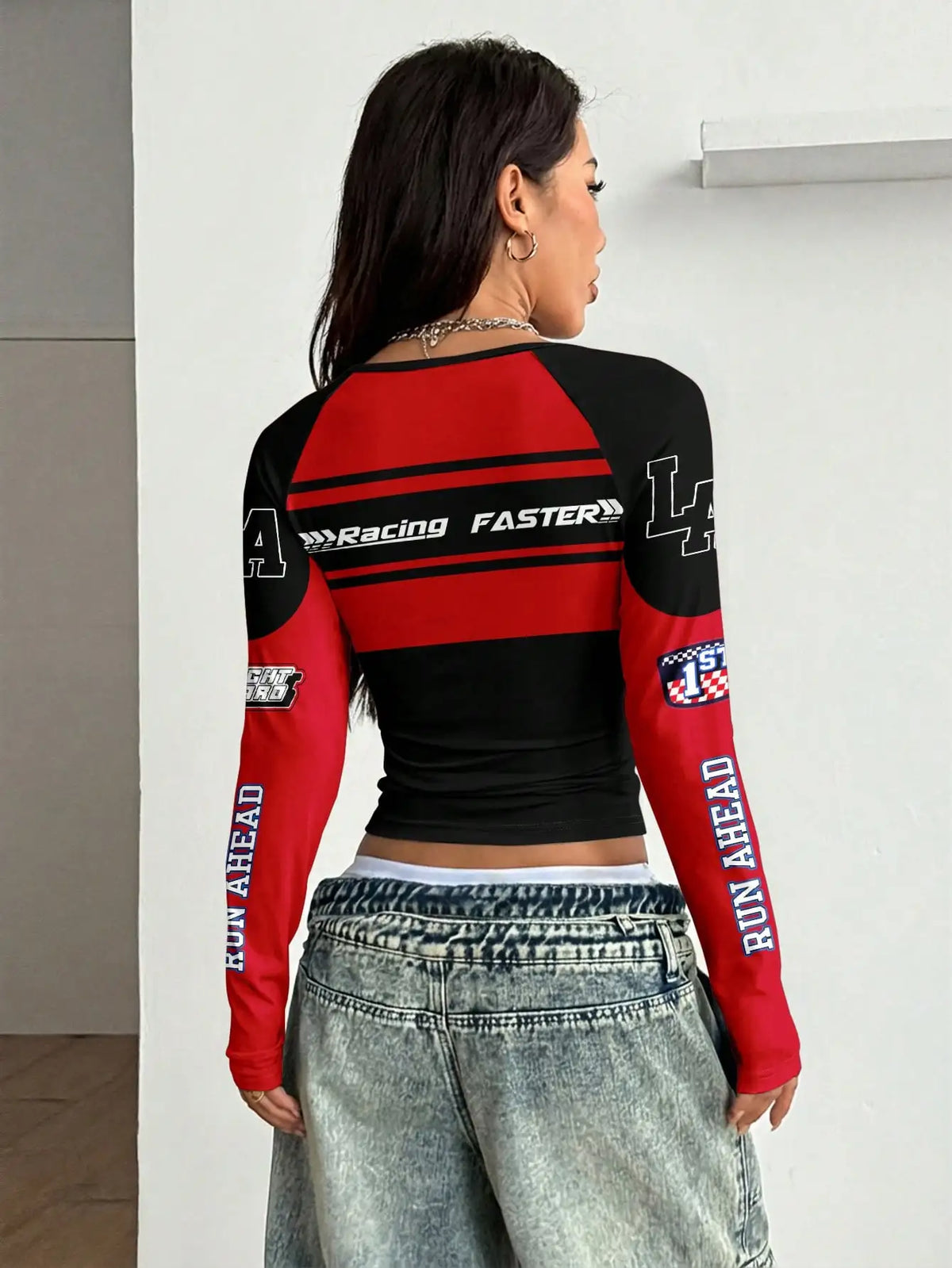 Raglan sleeve graphic T-shirt with motorcycle print by Corporación Turística, featuring vibrant design and casual style.