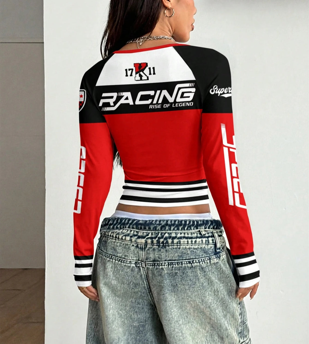Long sleeve T-shirt with numeric letter print from Corporación Turística, featuring a casual style and graphic design.